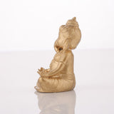 Medhira Ganesha Idol – Divine Calm in Gold and Silver