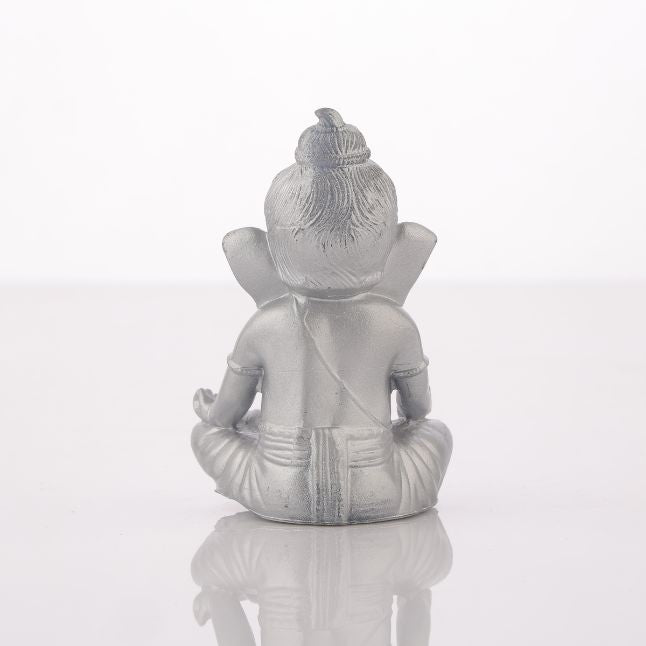 Medhira Ganesha Idol – Divine Calm in Gold and Silver